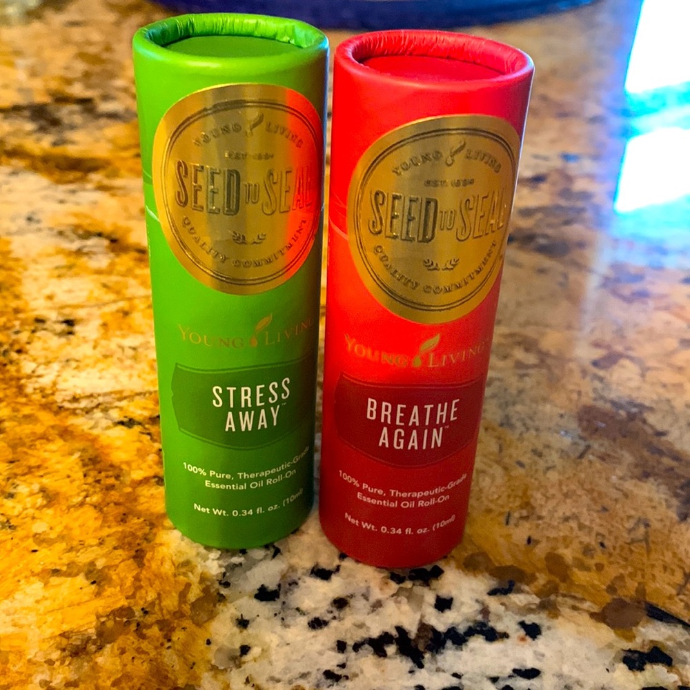 New  Young Living essential oil roll on: Breath Away and Stress away.
